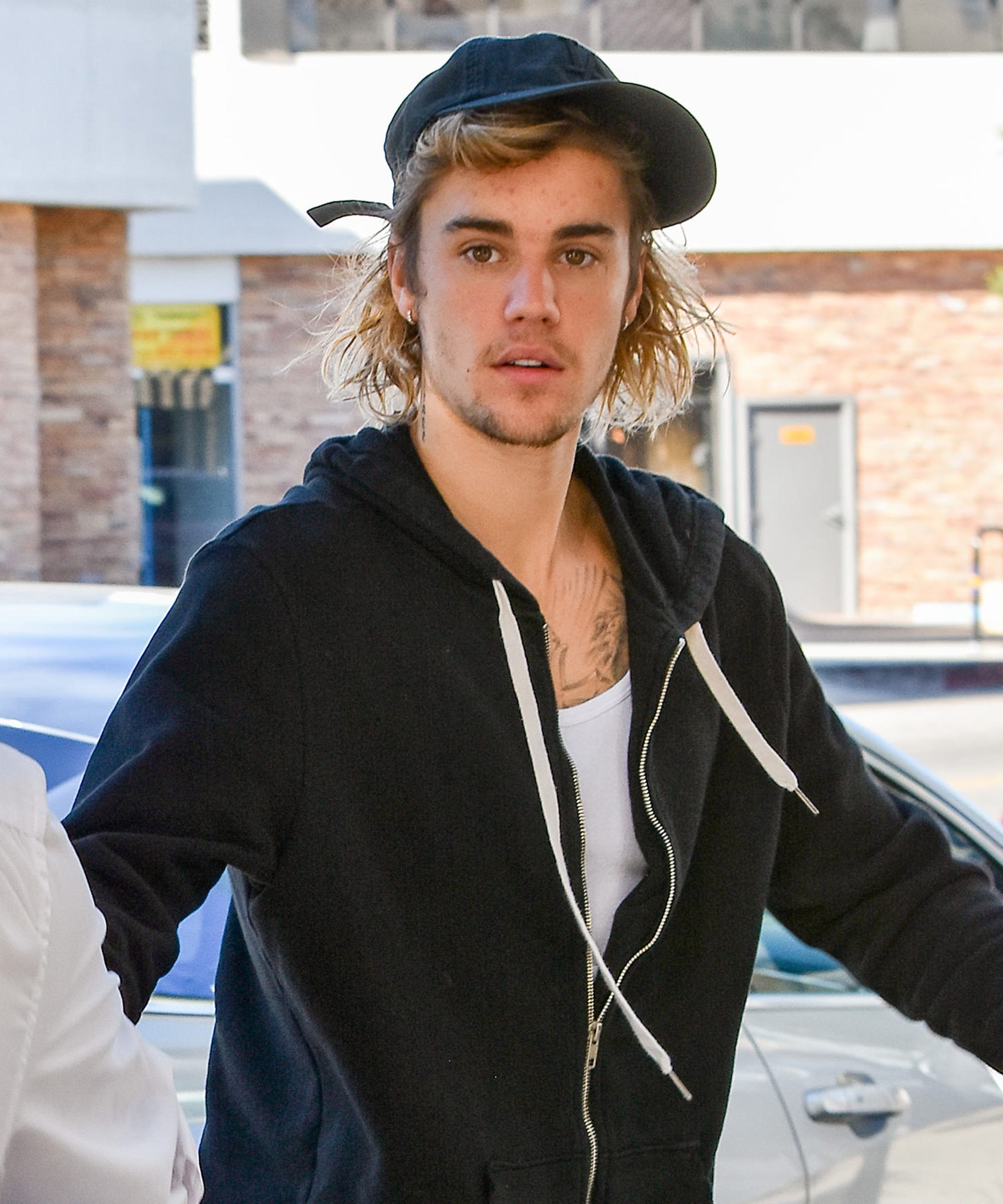 Why Isn T Justin Bieber S Infamous Face Tattoo On The Cover Of