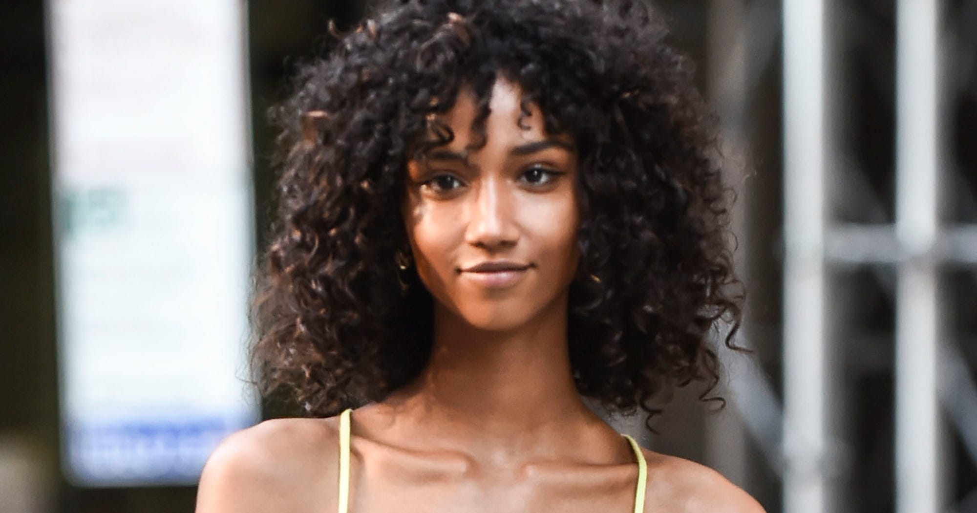 Curly Hair With Bangs Hairstyles To Inspire Your Look