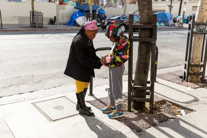 Michelle Parker's youngest daughter visits her at her one-room apartment on Skid Row.