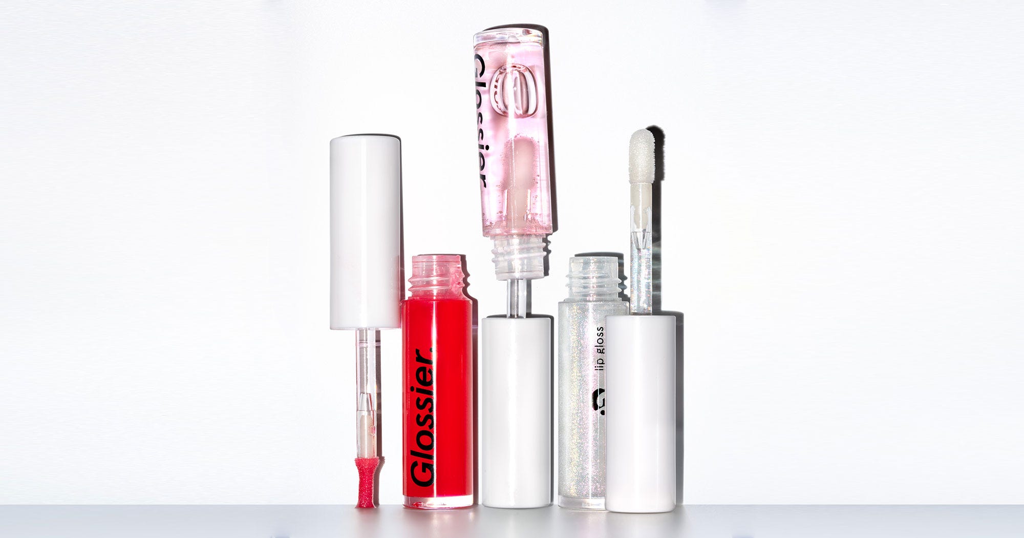 Glossier New Lip Gloss In Fun Red & Holographic Shades