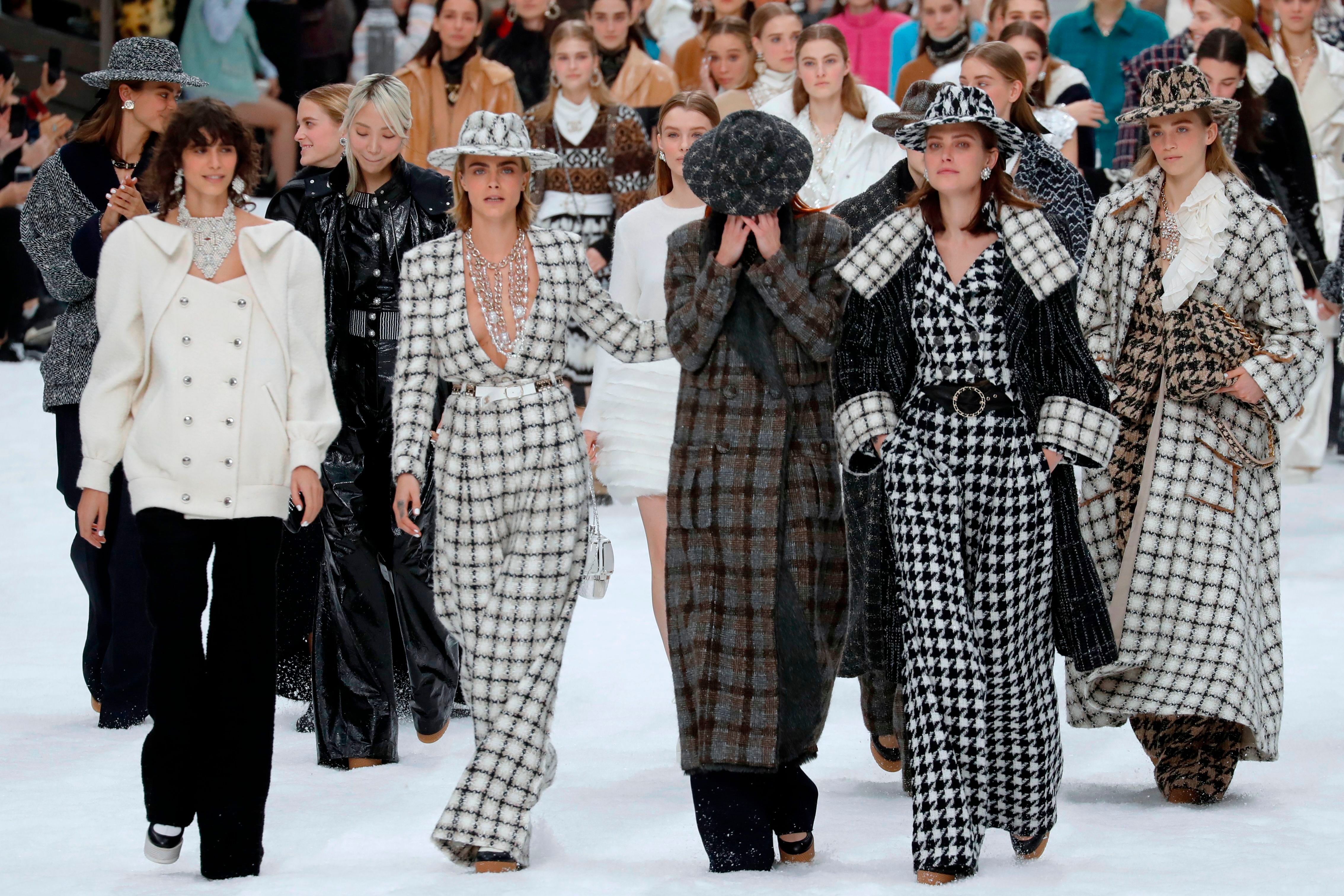 A model displays a creation by designer Karl Lagerfeld for Chanel