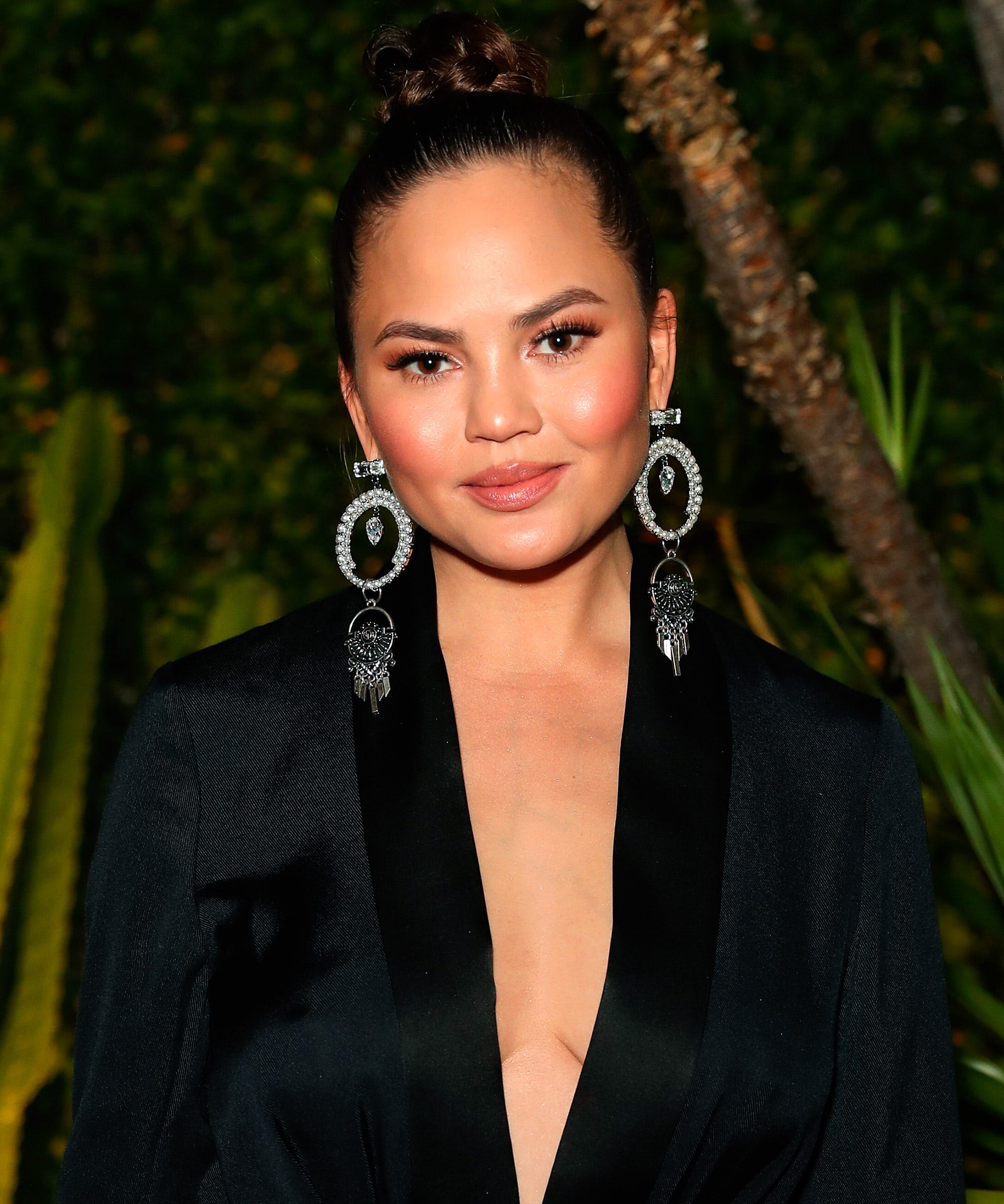 Chrissy Teigen Zip Jumpsuit Over Breasts Funny Video
