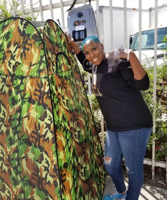A camping shower allows Raines to help individuals with disabilities who have difficulty reaching a shelter.