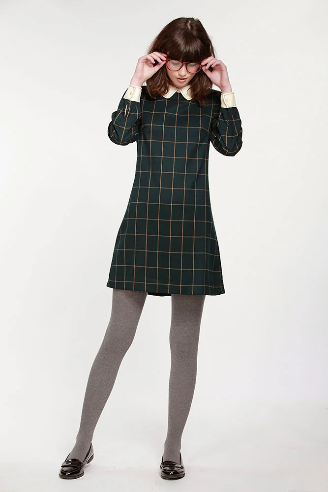taylor swift green plaid dress Taylor Swift wears plaid Miu Miu set at Kansas City children's hospital