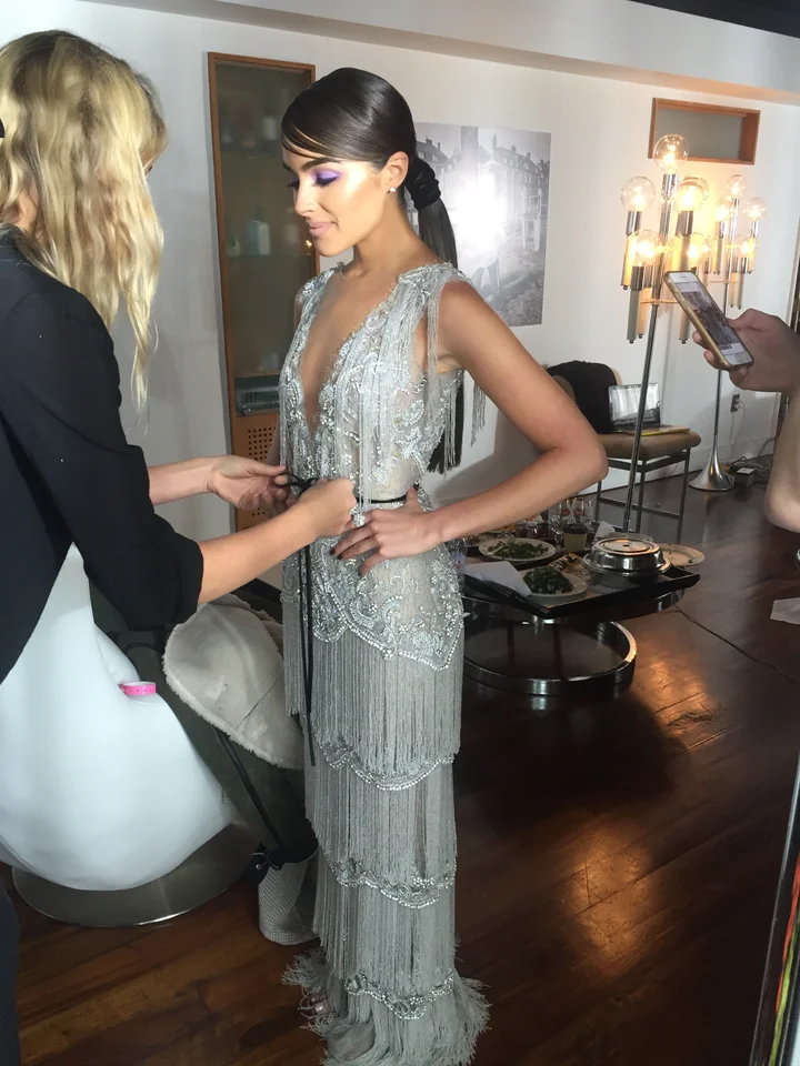 olivia culpo silver dress Olivia Culpo Stuns in Embellished Zac Posen Midi Gown and Silver Casadei Sandals